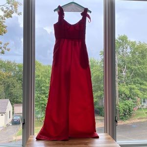 Anthropologie red and pink romper with shoulder bow details, wide leg pants